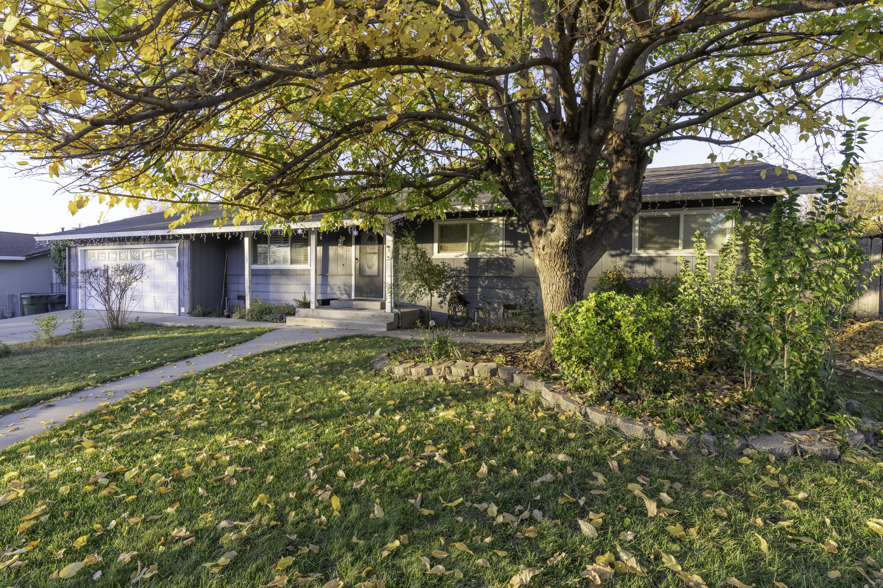 2816 Squire Avenue Redding, CA 96002 - Photo 1 of 13 front view of a house with a yard