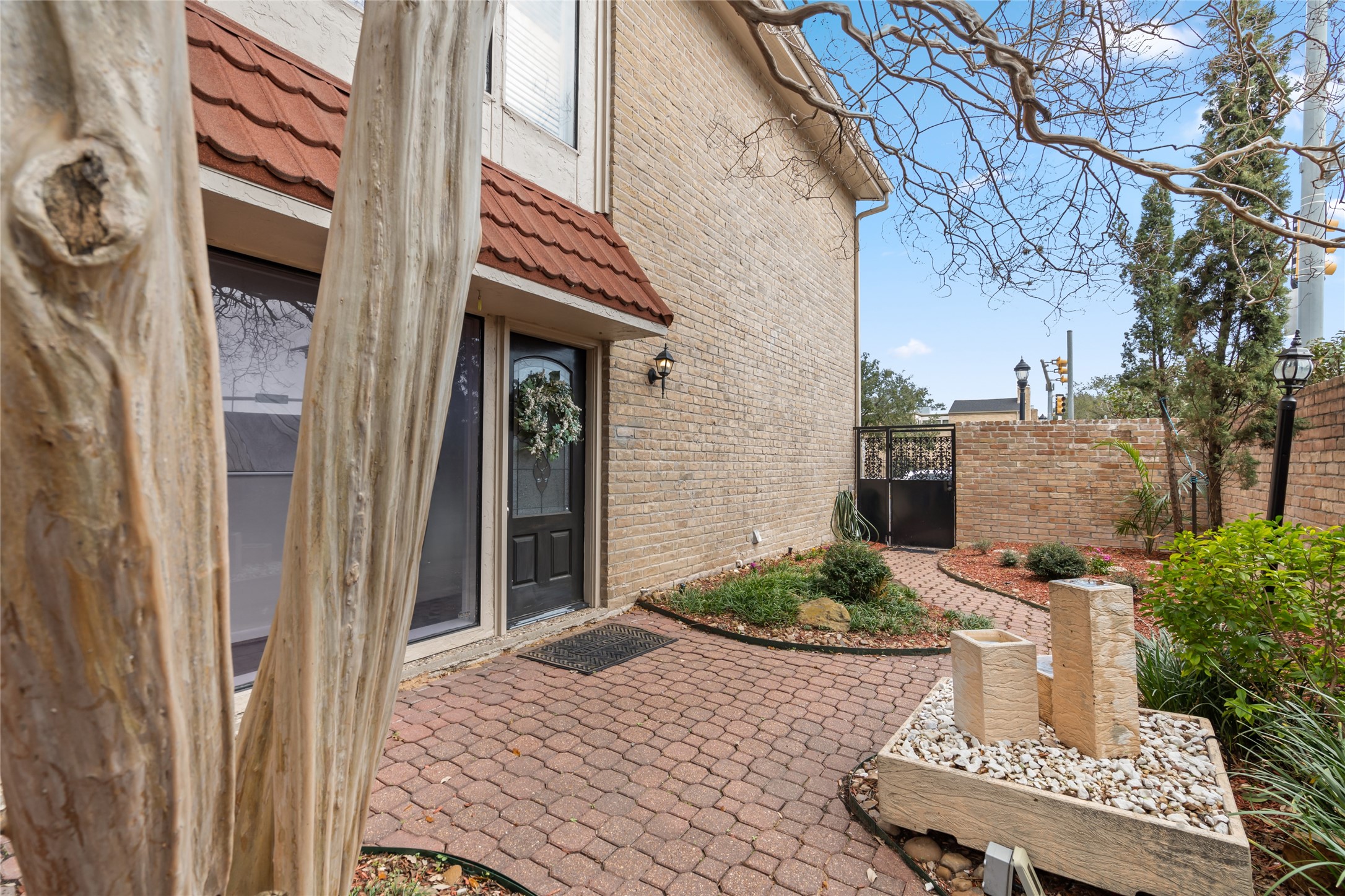 6728 Buffalo Speedway West University Place, TX 77005 - Photo 2 of 28 a view of outdoor space and porch