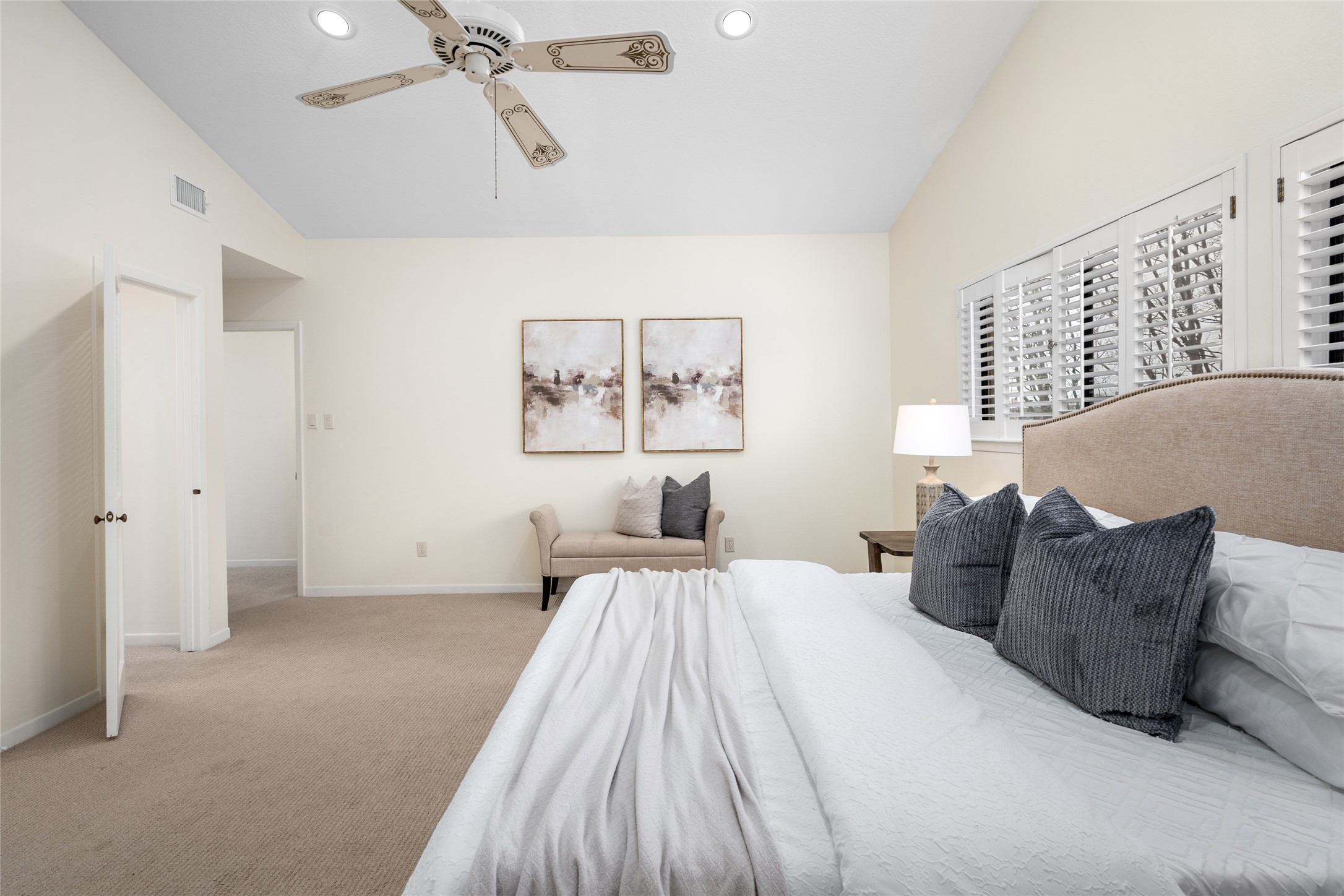 6728 Buffalo Speedway West University Place, TX 77005 - Photo 22 of 28 a spacious bedroom with a bed and painting on the wall