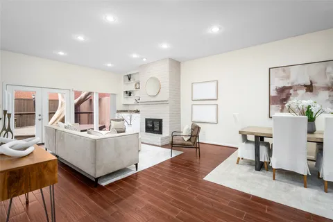 a view of kitchen with furniture and wooden floor