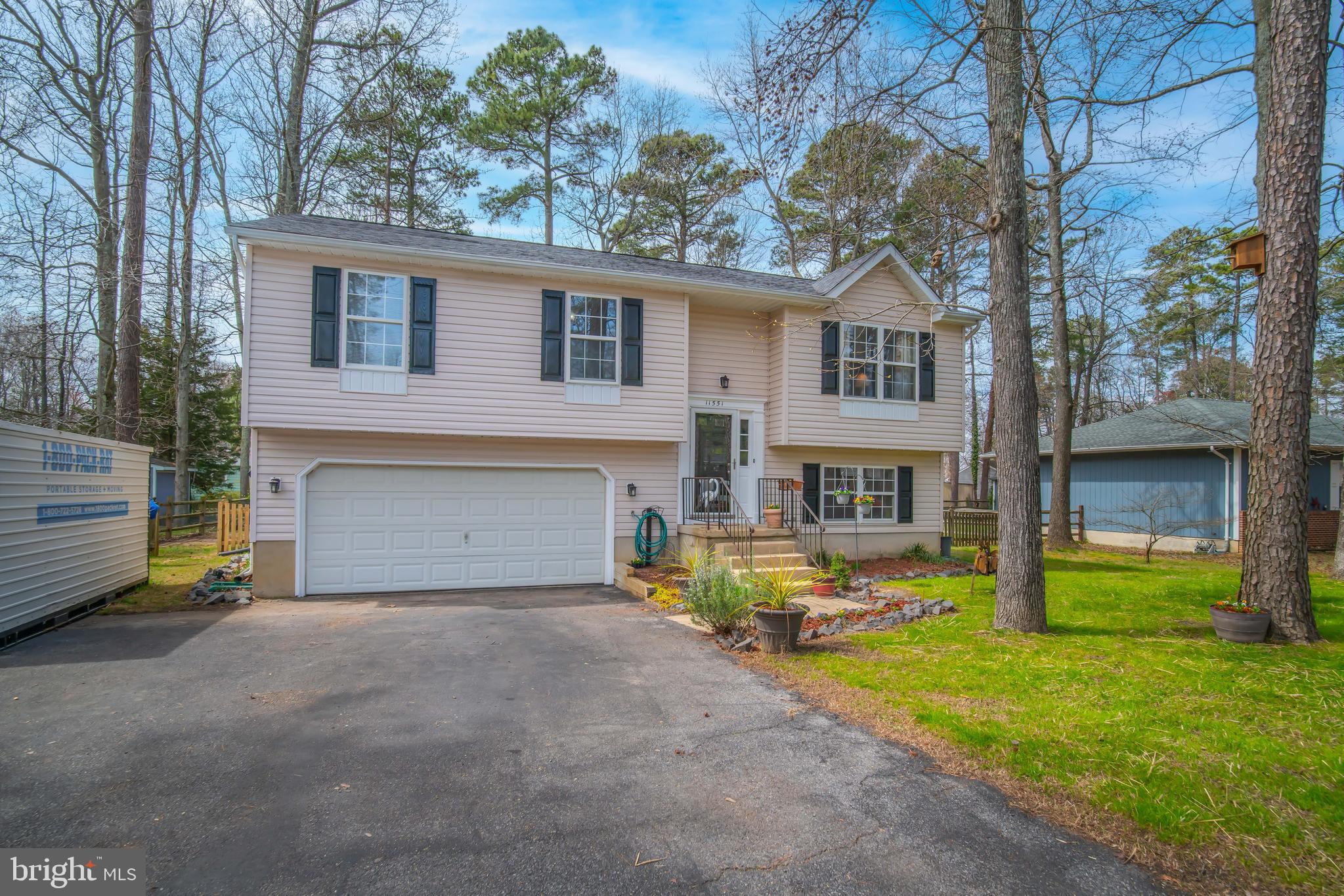 11551 San Rafael Road Lusby, MD 20657 - Photo 1 of 31 a view of a house with backyard and a tree