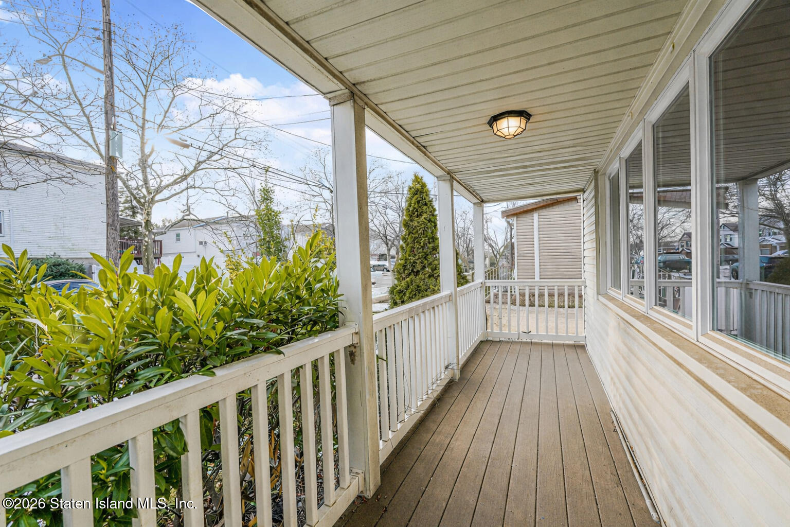 1 Fillat Street Staten Island, NY 10314 - Photo 3 of 39 a view of a balcony with wooden floor