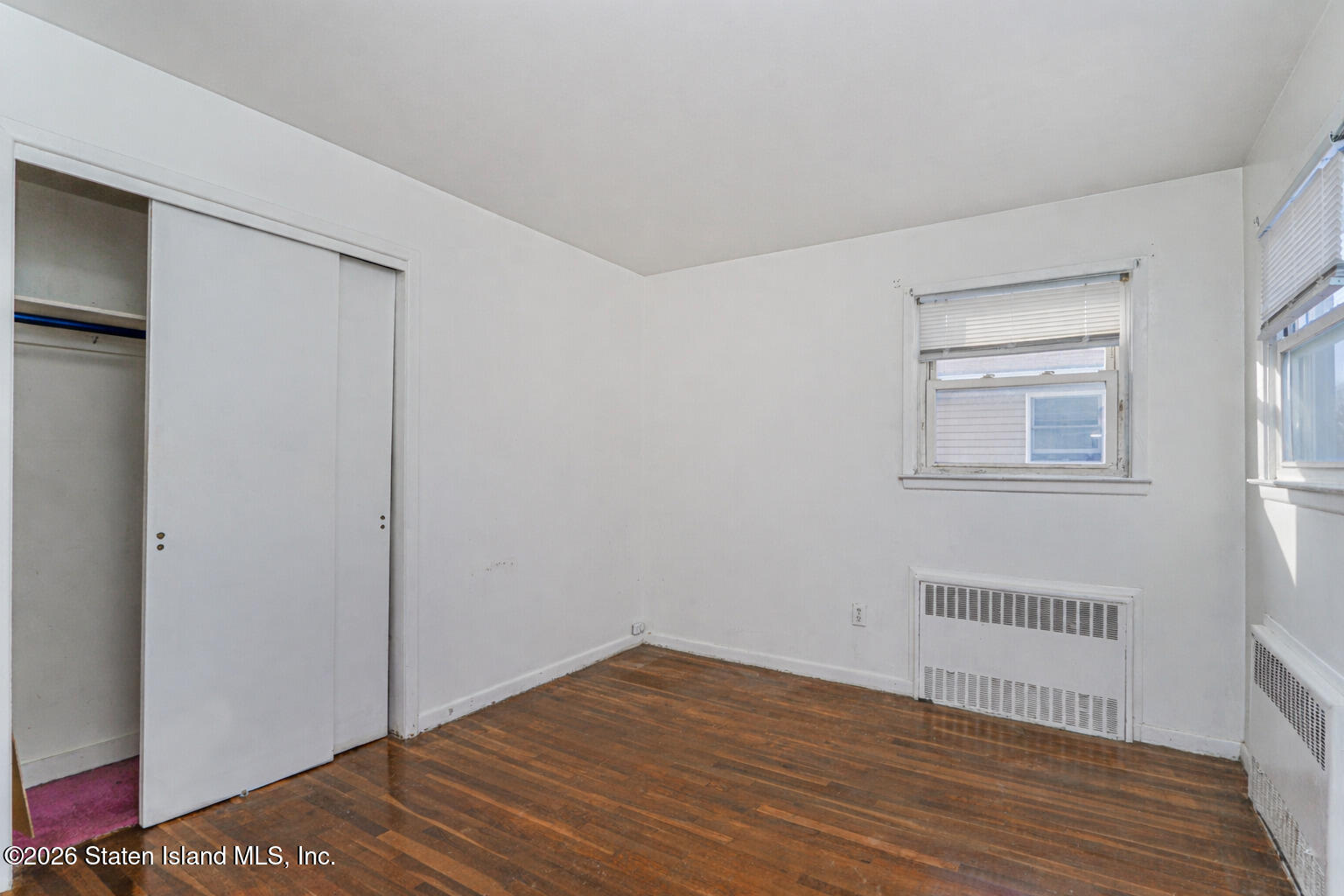 1 Fillat Street Staten Island, NY 10314 - Photo 36 of 39 a view of a room with wooden floor and a window