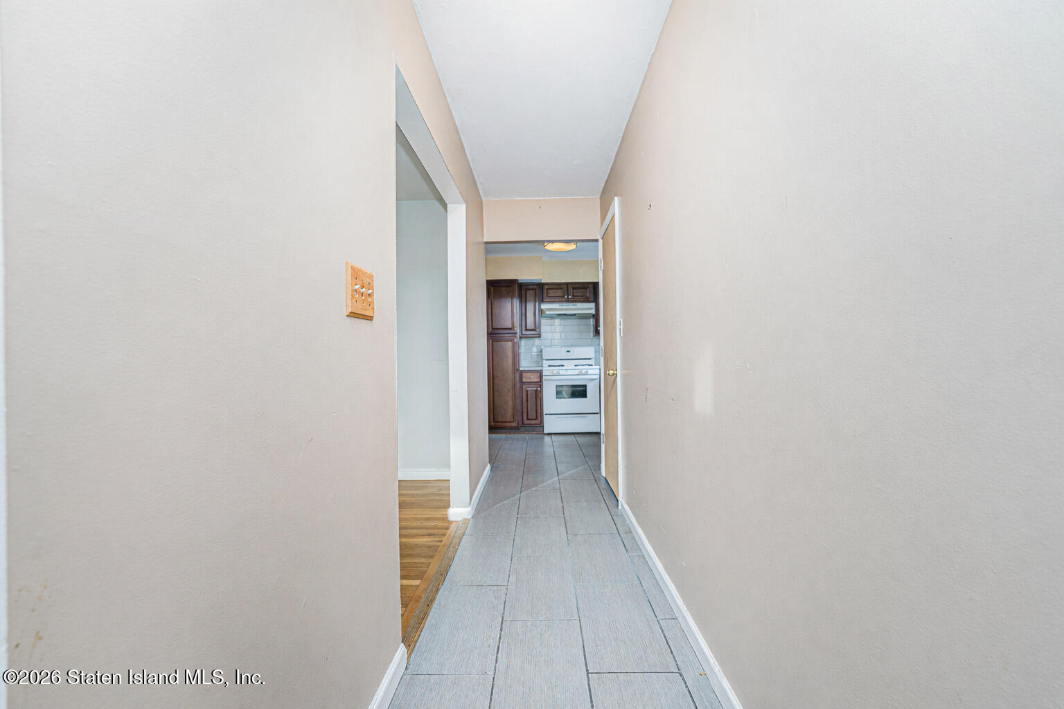1 Fillat Street Staten Island, NY 10314 - Photo 4 of 39 a view of a hallway with wooden floor