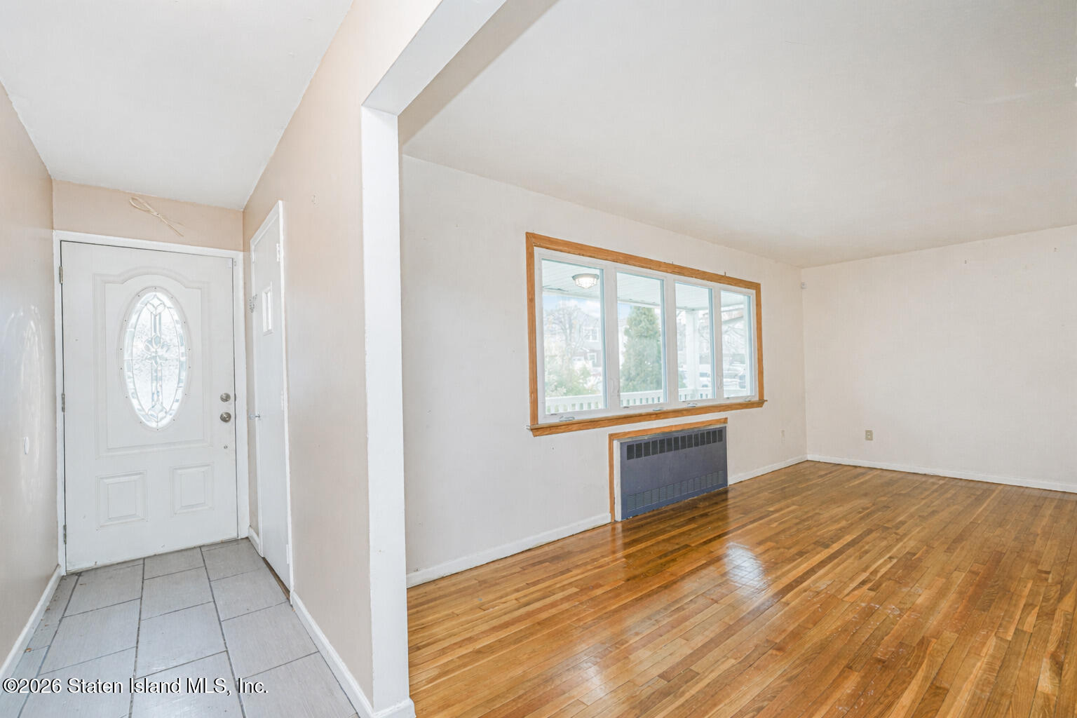 1 Fillat Street Staten Island, NY 10314 - Photo 5 of 39 an empty room with windows and closet