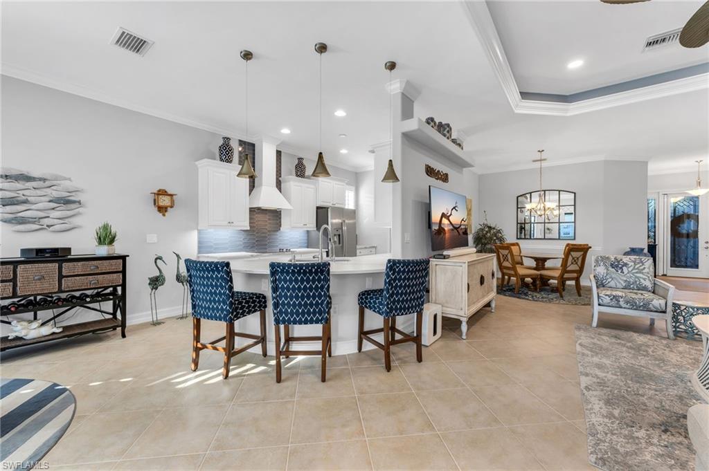 10318 Gator Bay Court Naples, FL 34120 - Photo 4 of 27 All new lighting and fans throughout