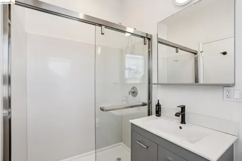 a view of balcony with wooden floor and outdoor seating