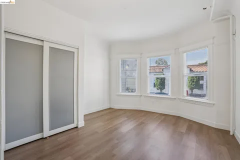 a dining hall with a dining table and chairs