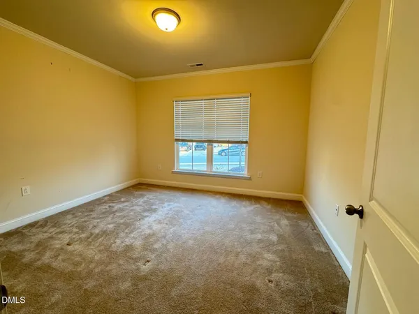 a view of a room with windows
