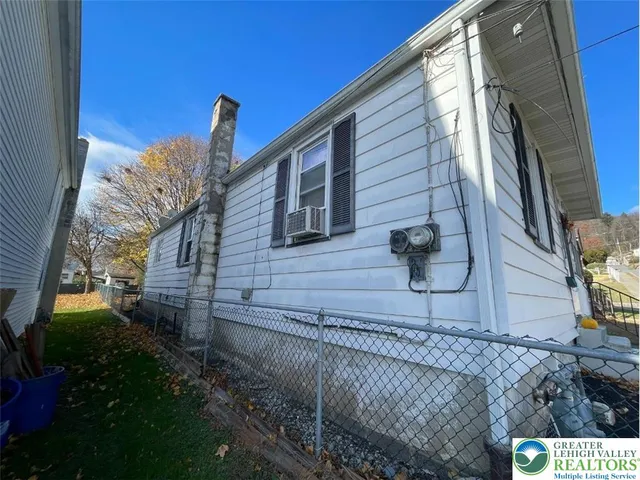 a kitchen with lots of appliances and cabinets