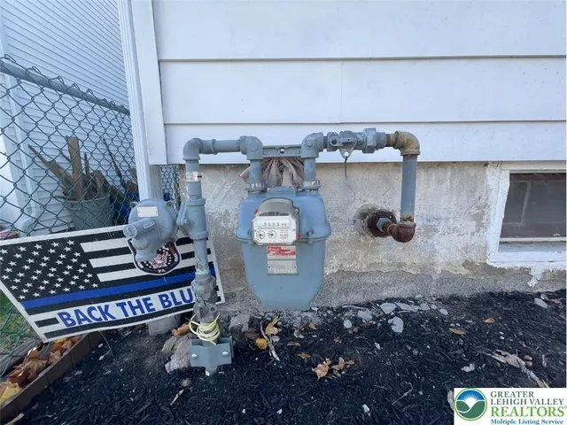 a bed room with a bed and a mirror