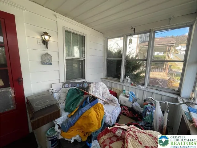 a room with lots of different colored cloths