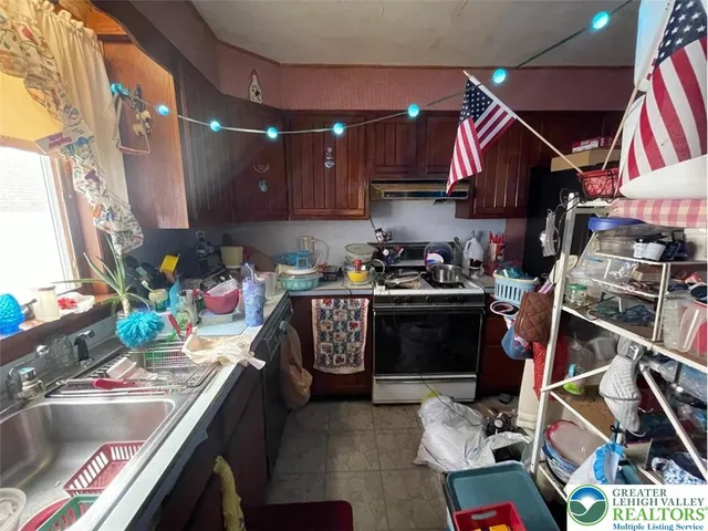 a bathroom with a toilet a sink and a mirror