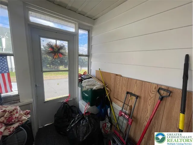 a room with toys and white walls