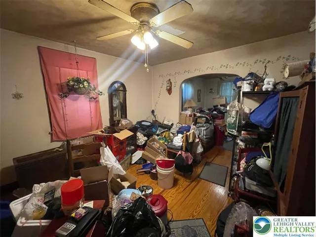 a room with gym equipment and a mirror