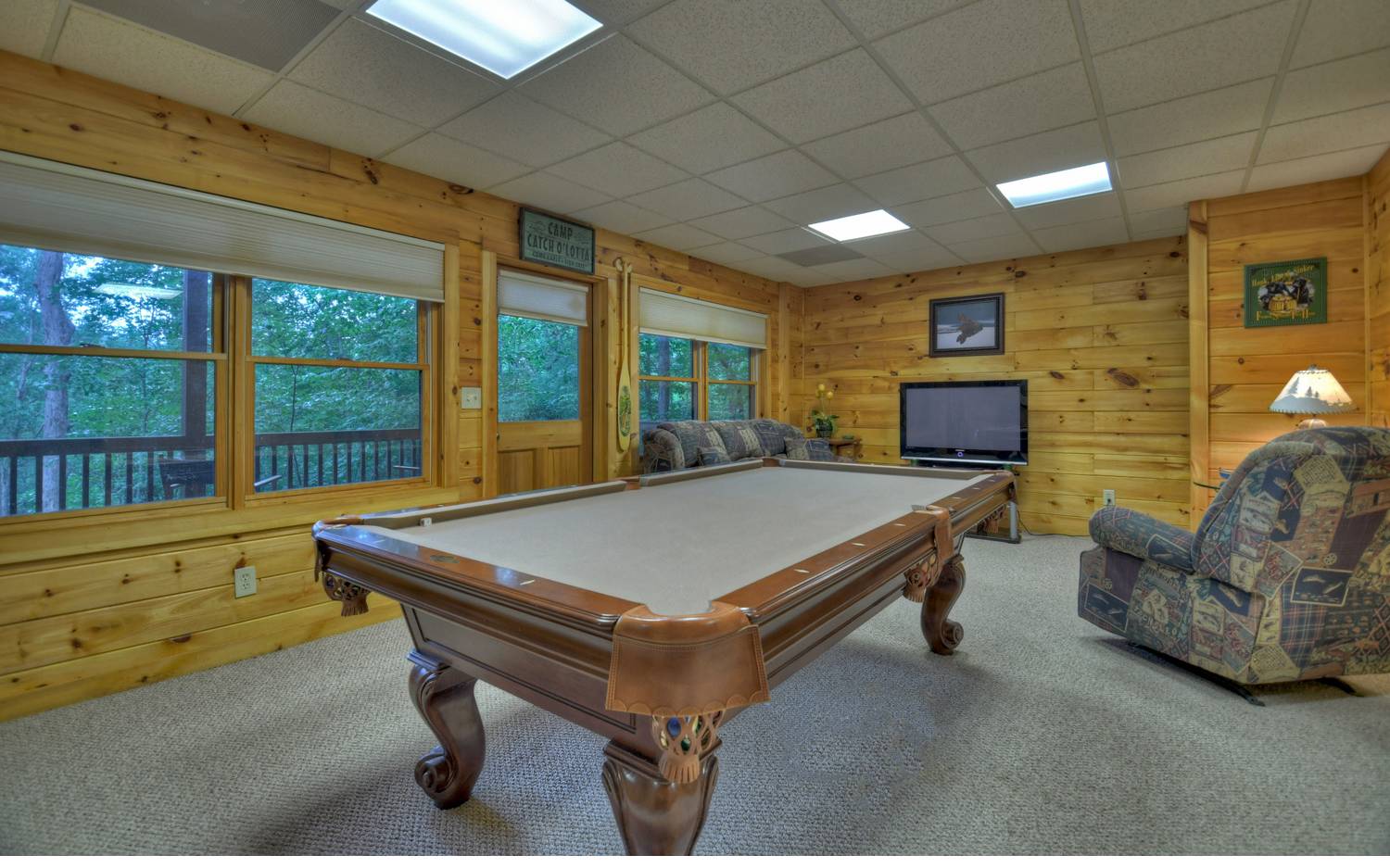 124 White Tail Ridge Blue Ridge, GA 30513 - Photo 12 of 42 a room with furniture pool table furniture and a floor to ceiling window