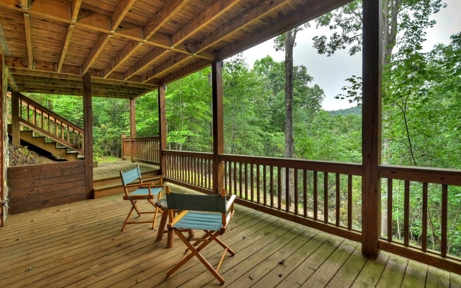 124 White Tail Ridge Blue Ridge, GA 30513 - Photo 32 of 42 a view of a chairs on wooden deck