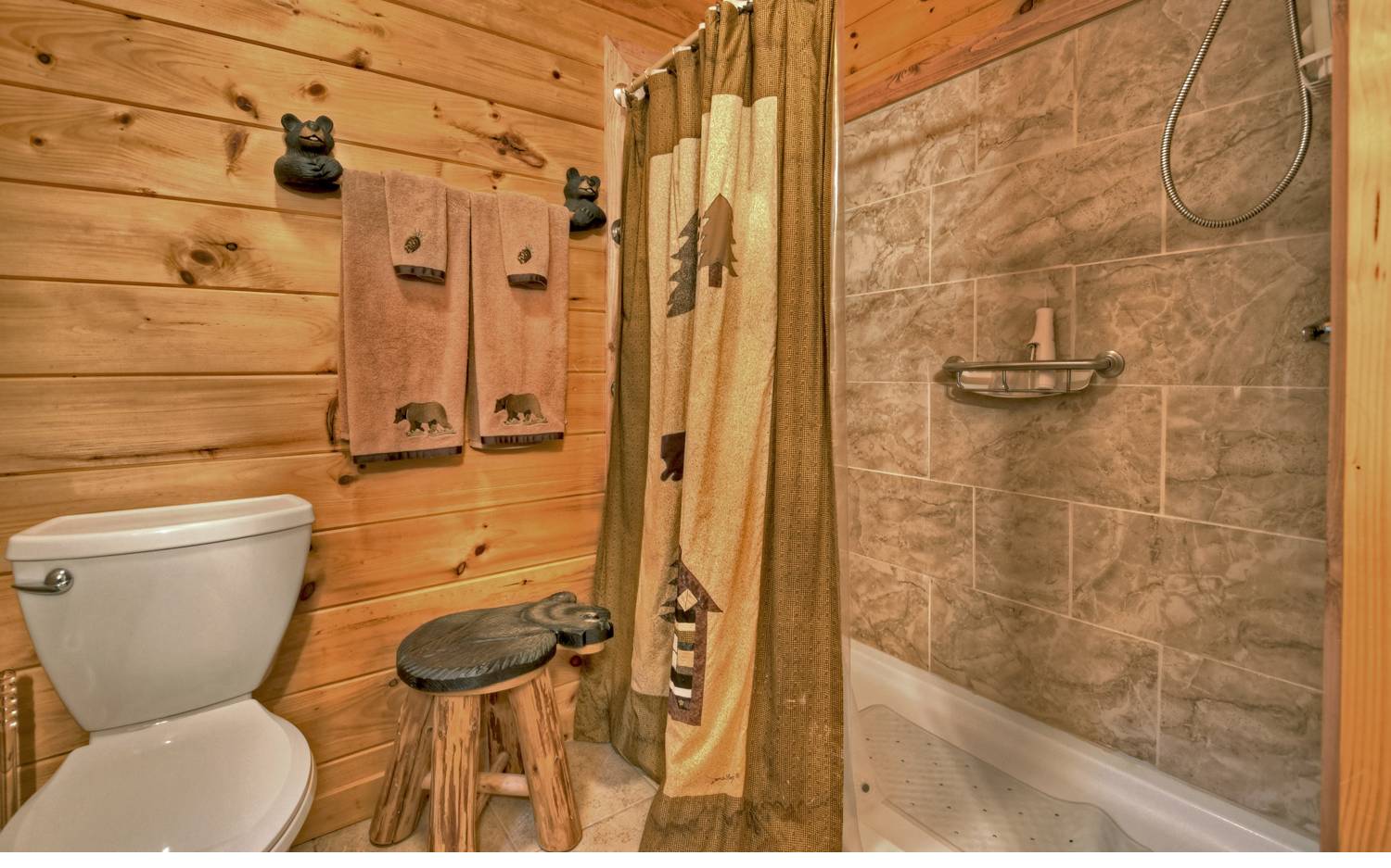 124 White Tail Ridge Blue Ridge, GA 30513 - Photo 36 of 42 a bathroom with a toilet and a shower