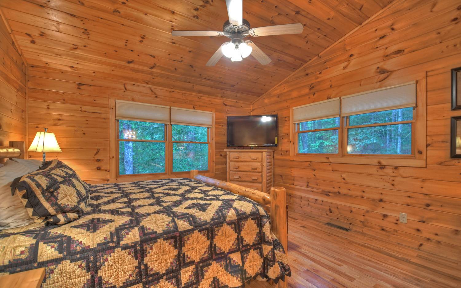 124 White Tail Ridge Blue Ridge, GA 30513 - Photo 37 of 42 a bed sitting in a bedroom next to a window