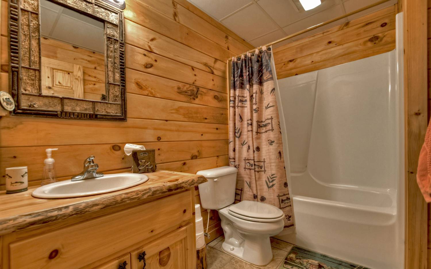 124 White Tail Ridge Blue Ridge, GA 30513 - Photo 41 of 42 a bathroom with a sink toilet and shower