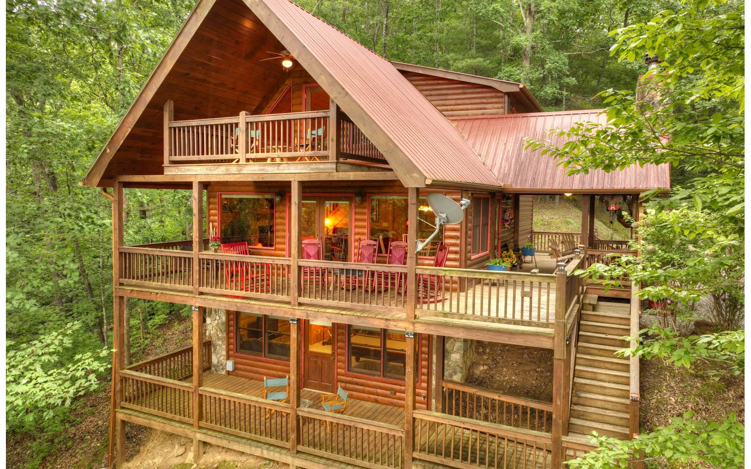 124 White Tail Ridge Blue Ridge, GA 30513 - Photo 7 of 42 a front view of a house with balcony