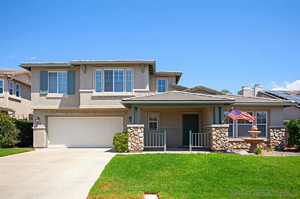 a front view of house with yard