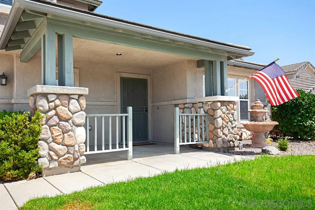 2170 Boulders Road Alpine, CA 91901 - Photo 3 of 24 front view of a house with a yard