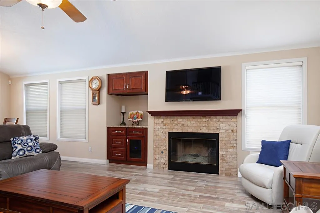 2170 Boulders Road Alpine, CA 91901 - Photo 8 of 24 a living room with furniture and a fireplace