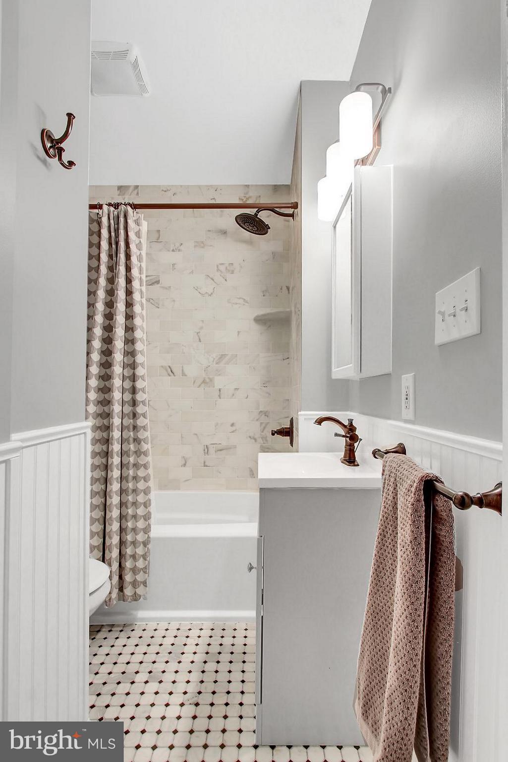 1104 Overbrook Road Baltimore, MD 21239 - Photo 14 of 28 Hall bath renovated 2018 w high end natural stone