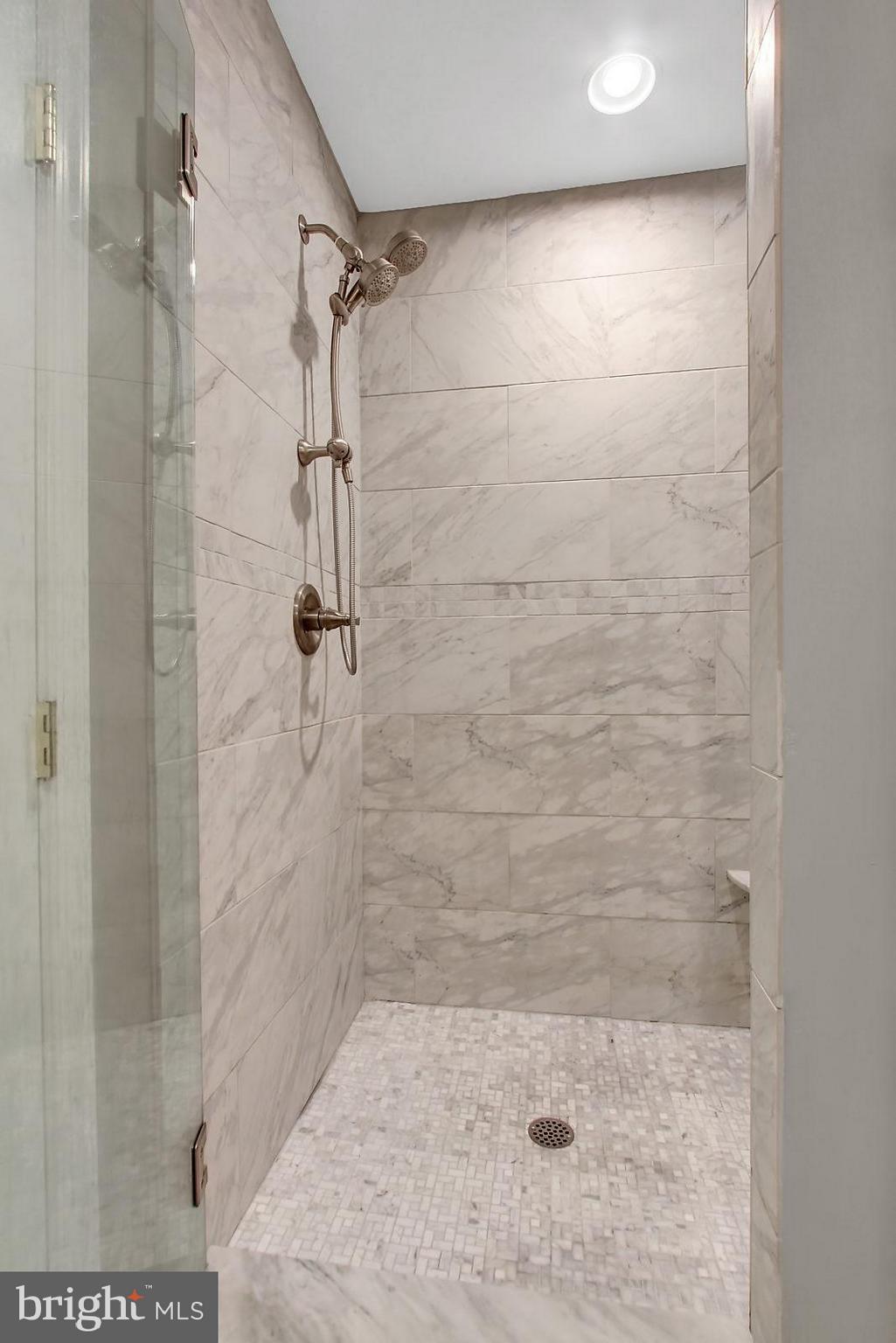 1104 Overbrook Road Baltimore, MD 21239 - Photo 20 of 28 Master walk in shower with bench.