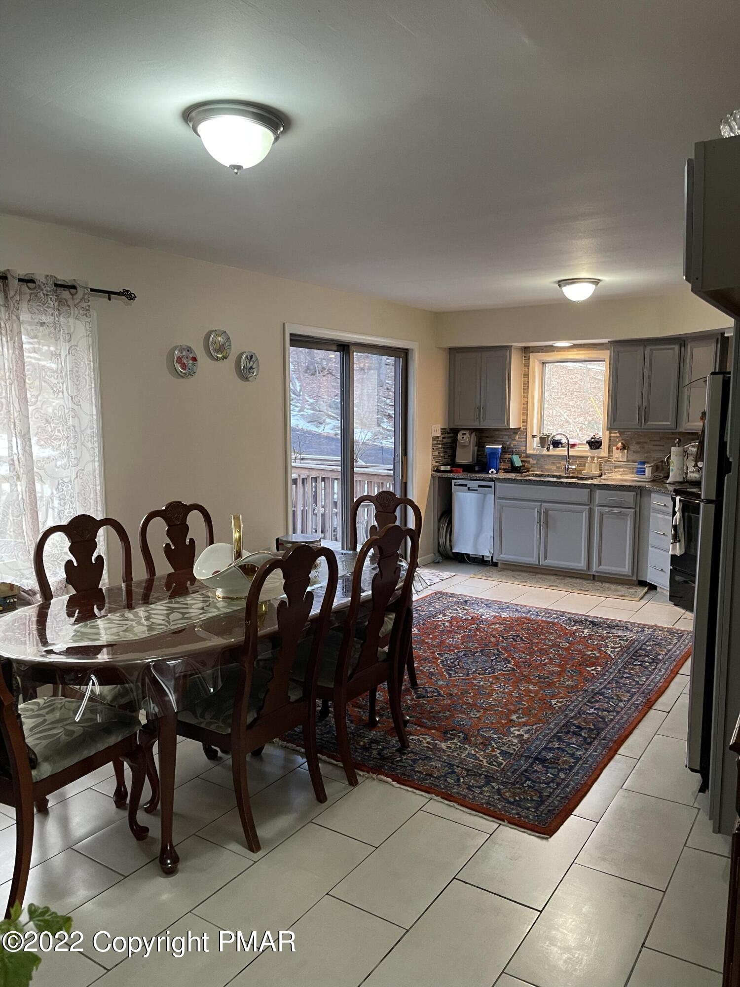 5665 Decker Road Bushkill, PA 18324 - Photo 10 of 32 a view of a dining room with furniture