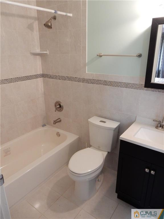 428 Morristown Road Old Bridge, NJ 07747 - Photo 14 of 25 a bathroom with a toilet a sink and bathtub