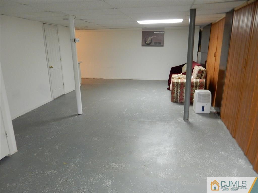 428 Morristown Road Old Bridge, NJ 07747 - Photo 21 of 25 a view of room with stairs