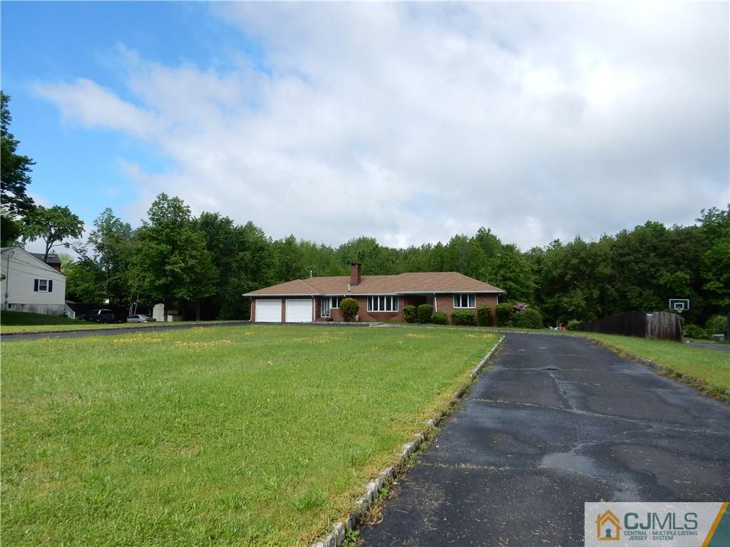 428 Morristown Road Old Bridge, NJ 07747 - Photo 23 of 25 a view of a big yard next to a building