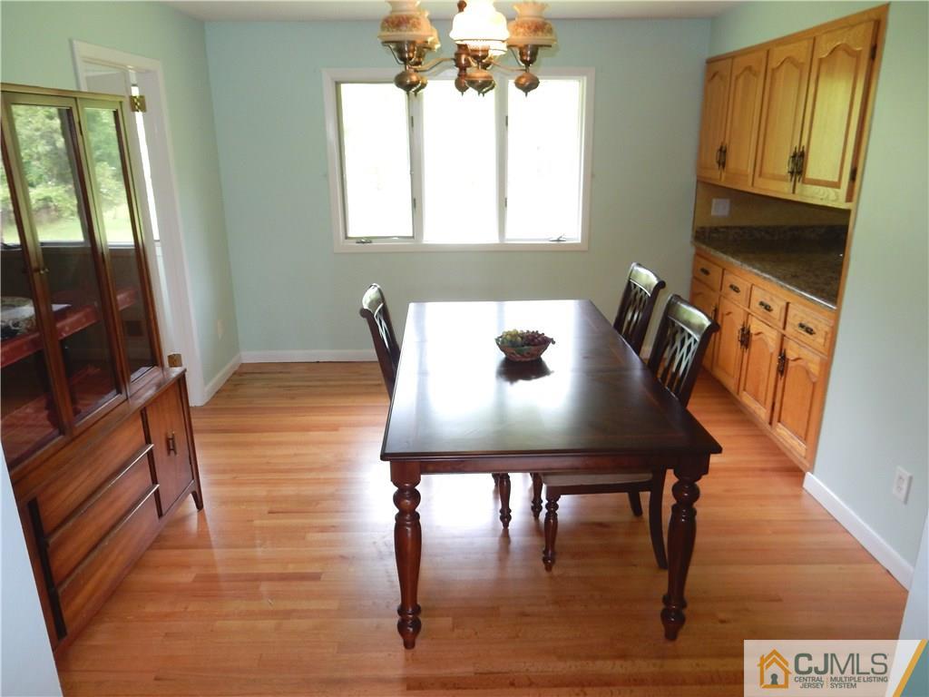 428 Morristown Road Old Bridge, NJ 07747 - Photo 5 of 25 a view of a dining room with furniture and window