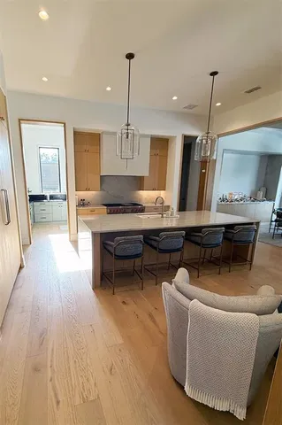 a bathroom with a double vanity sink mirror double and shower