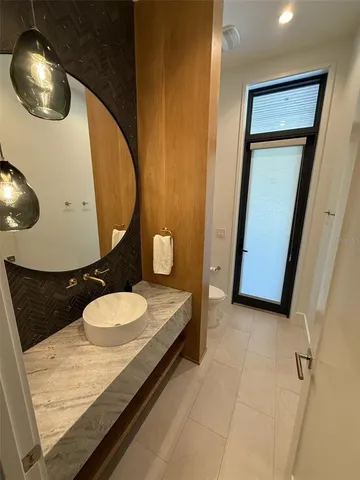 a room with gym equipment and a window