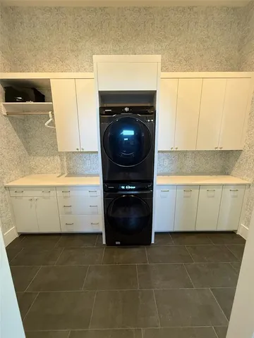 a kitchen with a sink and a window
