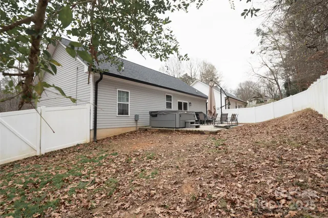 a house with a tree in the background