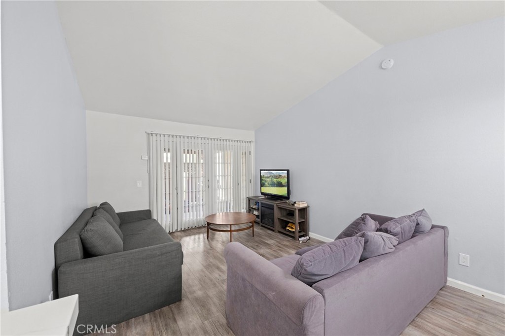9505 Arlington Avenue, Unit 54 Riverside, CA 92503 - Photo 13 of 29 a living room with furniture and a large window