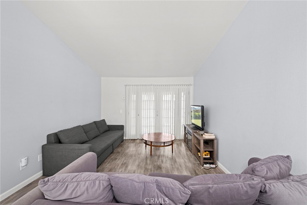 9505 Arlington Avenue, Unit 54 Riverside, CA 92503 - Photo 14 of 29 a living room with furniture and a large window