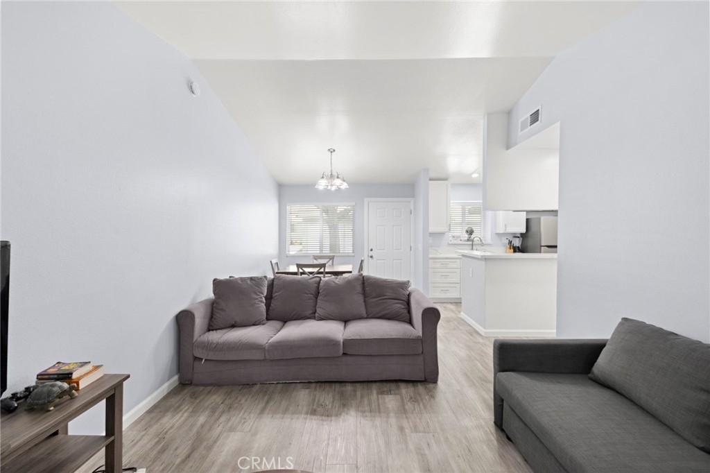 9505 Arlington Avenue, Unit 54 Riverside, CA 92503 - Photo 16 of 29 a living room with furniture and a couch