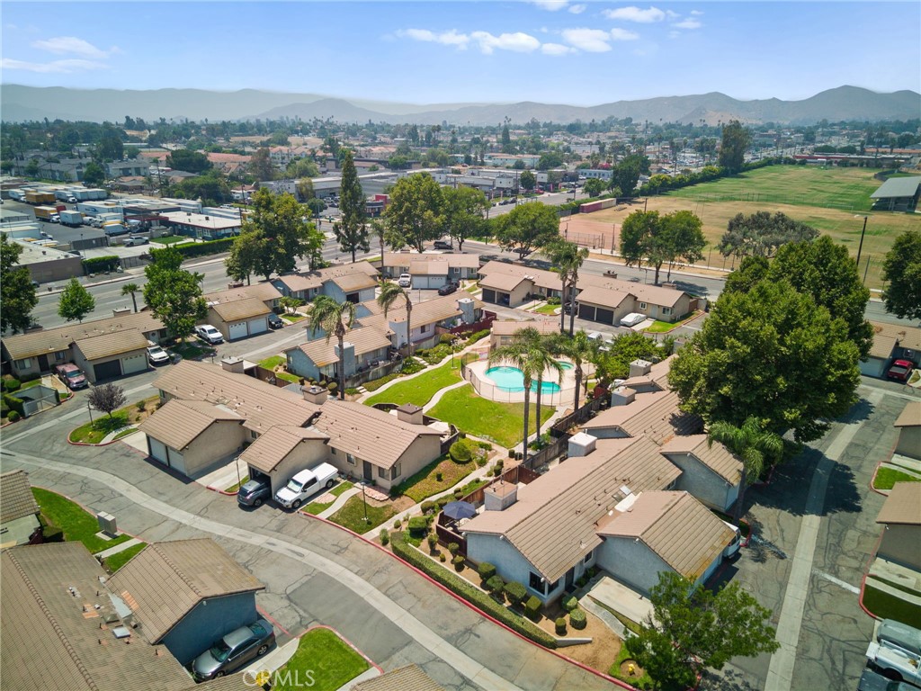 9505 Arlington Avenue, Unit 54 Riverside, CA 92503 - Photo 29 of 29 an aerial view of residential houses with outdoor space