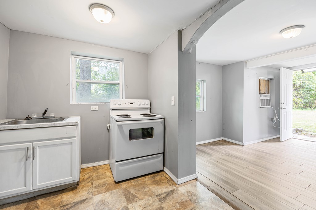 2113 Summerville Road Phenix City, AL 36867 - Photo 32 of 37 a view of a kitchen with sink washer and dryer