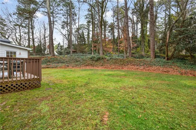 a backyard of a house with lots of green space