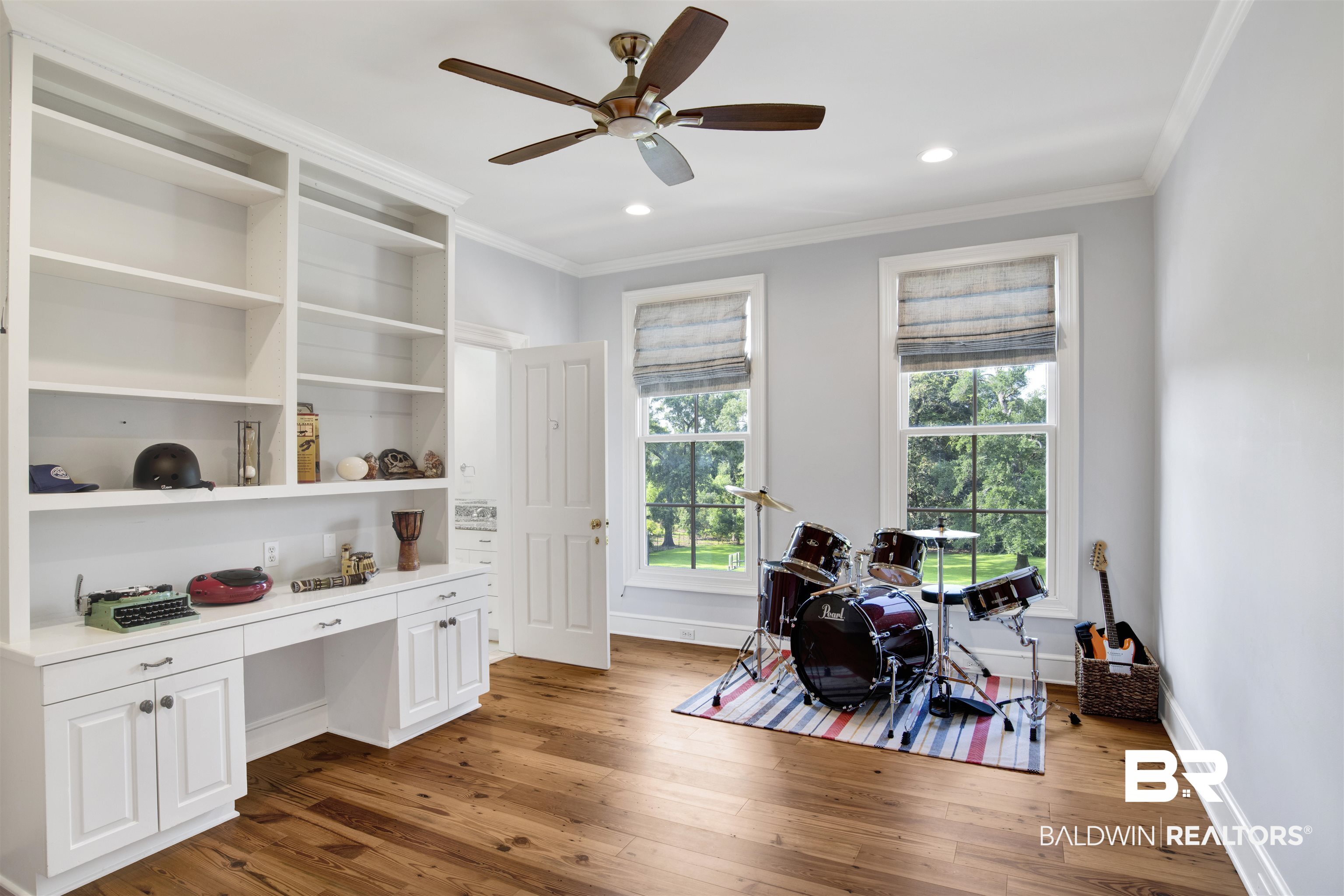 3816 Austill Lane Mobile, AL 36608 - Photo 41 of 80 Office with built in desk, hardwood / wood-style floors, crown molding, ceiling fan, and recessed lighting