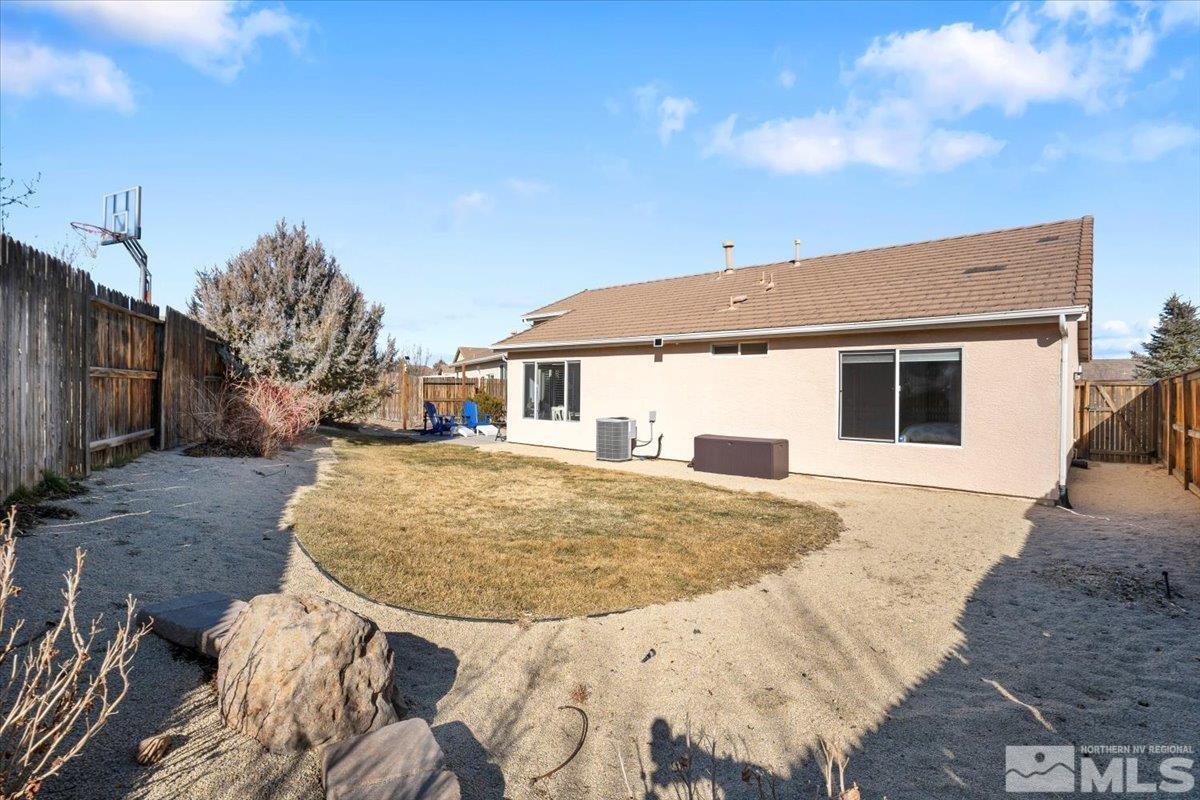 1870 D'Arques Court Reno, NV 89521 - Photo 31 of 33 a front view of a house with a garden
