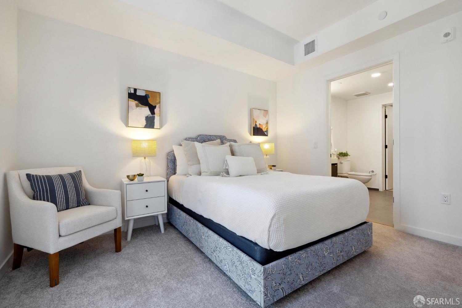 988 Harrison Street, Unit CK3 San Francisco, CA 94107 - Photo 9 of 15 a bed room with a bed and a couch