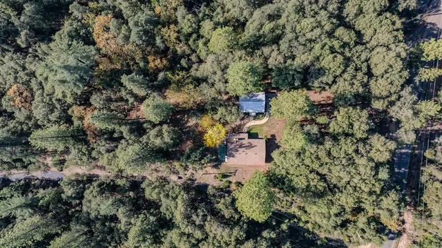 a kitchen with stainless steel appliances a refrigerator sink and cabinets