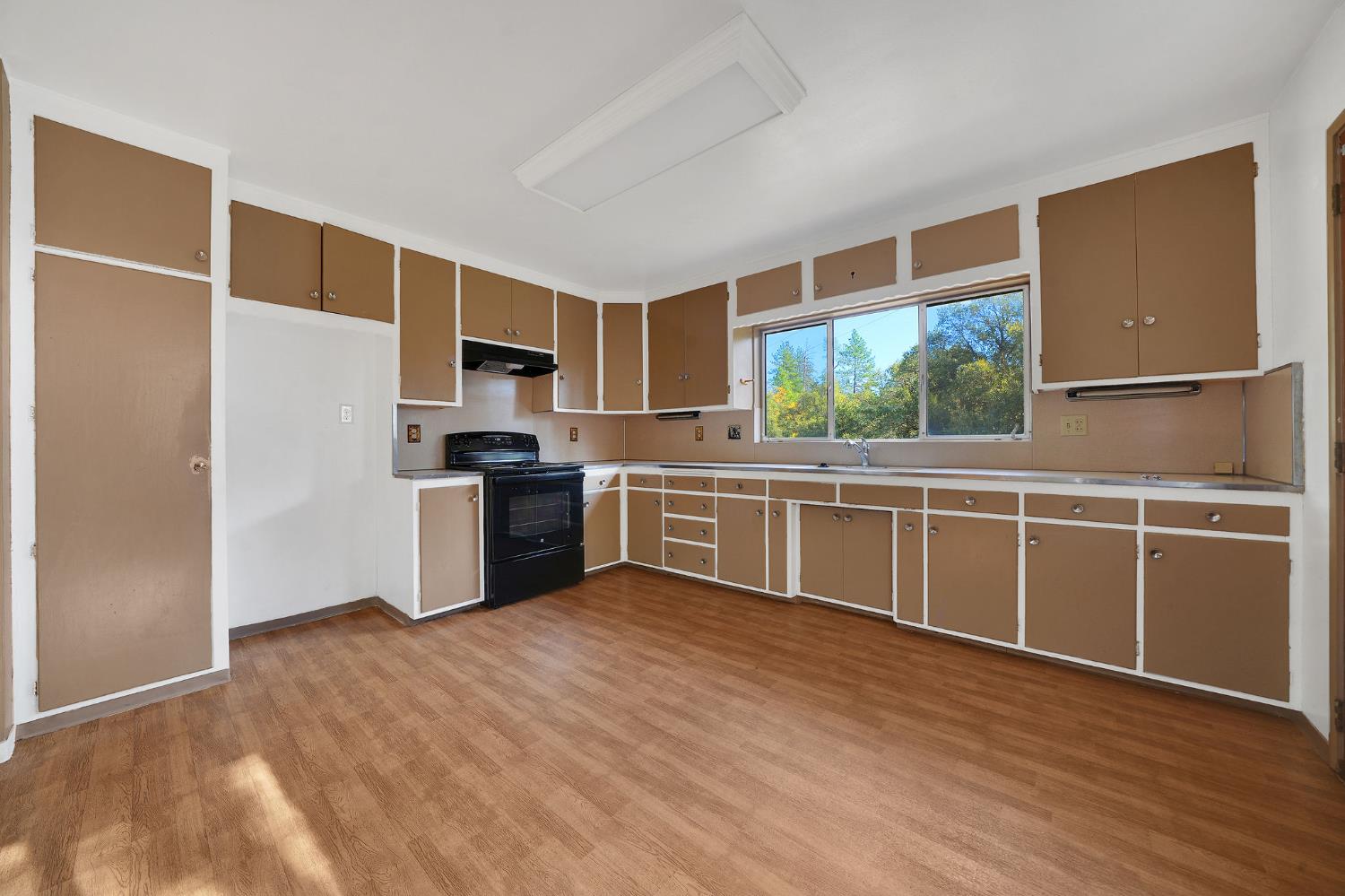 13309 Taves Road Jackson, CA 95642 - Photo 41 of 62 a kitchen with stainless steel appliances a refrigerator sink and cabinets